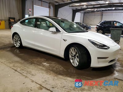 Czwarte zdjęcie samochodu z boku: 2019 TESLA MODEL 3 VIN:5YJ3E1EB2KF469576 - miniatura