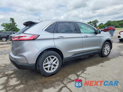Trzecie zdjęcie samochodu z tyłu: 2022 FORD EDGE SEL VIN:2FMPK4J9XNBB08852 - miniatura