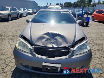 Piąte zdjęcie samochodu w środku: 2004 HONDA CIVIC EX VIN:1HGEM21964L051494 - miniatura