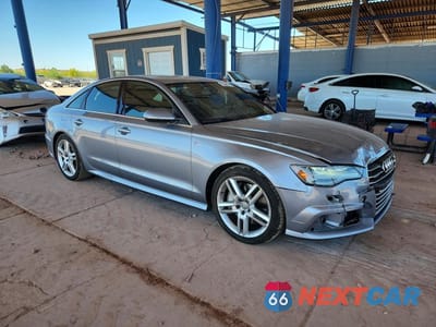 Czwarte zdjęcie samochodu z boku: 2016 AUDI A6 PREMIUM PLUS VIN:WAUFGAFC0GN050565 - miniatura