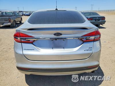 Zdjęcie 6 z 12 samochodu: 2018 FORD FUSION SE HYBRID VIN:3FA6P0LU7JR124441 - miniatura
