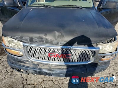 Zdjęcie 12 z 13 samochodu: 2005 GMC YUKON XL DENALI VIN:1GKFK66U55J221326 - miniatura