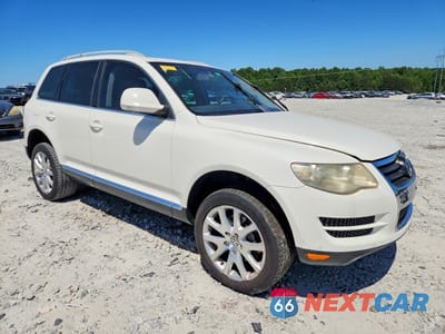Czwarte zdjęcie samochodu z boku: 2009 VOLKSWAGEN TOUAREG 2 V6 TDI VIN:WVGFM77L59D035108 - miniatura