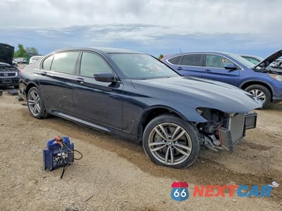 Czwarte zdjęcie samochodu z boku: 2018 BMW 750 XI VIN:WBA7F2C54JG424965 - miniatura