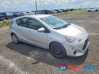 Czwarte zdjęcie samochodu z boku: 2015 TOYOTA PRIUS C VIN:JTDKDTB36F1100774 - miniatura