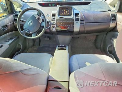 Zdjęcie 8 z 14 samochodu: 2004 TOYOTA PRIUS BASE VIN:JTDKB20U640035942 - miniatura