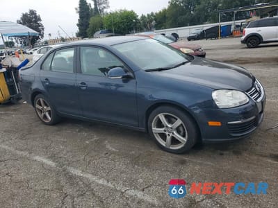 Czwarte zdjęcie samochodu z boku: 2009 VOLKSWAGEN JETTA S VIN:3VWJZ71K19M089216 - miniatura