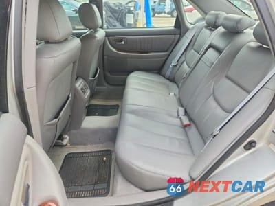 Zdjęcie 10 z 12 samochodu: 2003 TOYOTA AVALON XLS VIN:4T1BF28B03U326396 - miniatura