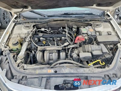 Zdjęcie 11 z 12 samochodu: 2012 FORD FUSION S VIN:3FAHP0GA8CR333747 - miniatura