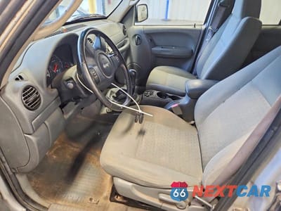 Zdjęcie 7 z 12 samochodu: 2007 JEEP LIBERTY SPORT VIN:1J4GL48K77W510432 - miniatura