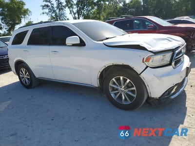 Czwarte zdjęcie samochodu z boku: 2015 DODGE DURANGO LIMITED VIN:1C4RDHDGXFC708961 - miniatura