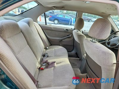 Zdjęcie 10 z 12 samochodu: 2000 HONDA CIVIC LX VIN:1HGEJ6675YL027717 - miniatura