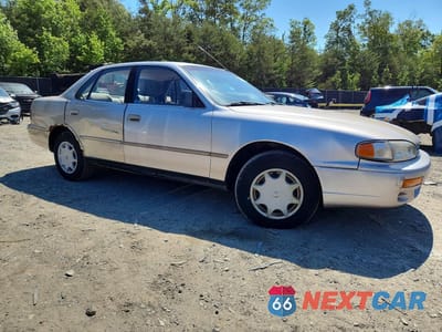 Czwarte zdjęcie samochodu z boku: 1995 TOYOTA CAMRY DX VIN:JT2SK11E2S0326624 - miniatura