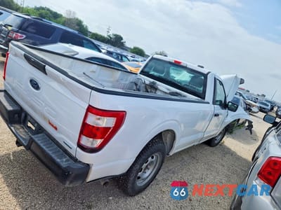 Trzecie zdjęcie samochodu z tyłu: 2022 FORD F150 VIN:1FTMF1CPXNKD77154 - miniatura