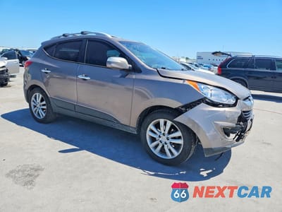 Czwarte zdjęcie samochodu z boku: 2013 HYUNDAI TUCSON LIMITED VIN:KM8JU3AC4DU579961 - miniatura