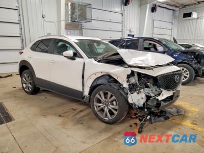 Czwarte zdjęcie samochodu z boku: 2022 MAZDA CX-30 SELECT VIN:3MVDMBBL1NM423634 - miniatura