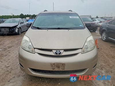 Piąte zdjęcie samochodu w środku: 2010 TOYOTA SIENNA LE 7-PASSENGER VIN:5TDKK4CC2AS327689 - miniatura
