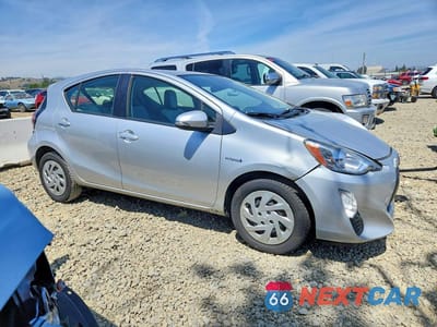 Czwarte zdjęcie samochodu z boku: 2016 TOYOTA PRIUS C ONE VIN:JTDKDTB33G1590592 - miniatura