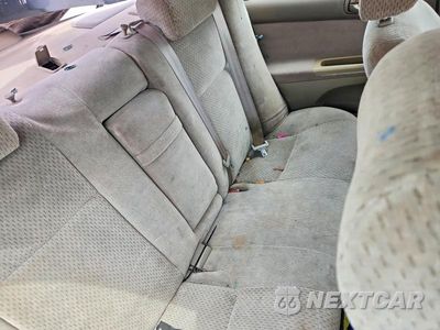 Zdjęcie 10 z 12 samochodu: 2003 TOYOTA CAMRY LE V6 VIN:4T1BF32K83U546626 - miniatura