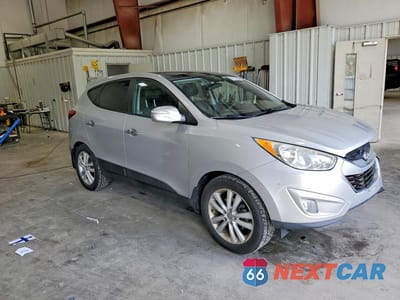 Czwarte zdjęcie samochodu z boku: 2011 HYUNDAI TUCSON LIMITED VIN:KM8JUCAC9BU228069 - miniatura