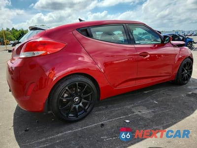 Trzecie zdjęcie samochodu z tyłu: 2013 HYUNDAI VELOSTER BASE VIN:KMHTC6AD9DU165256 - miniatura