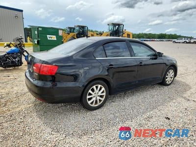 Trzecie zdjęcie samochodu z tyłu: 2013 VOLKSWAGEN JETTA SE VIN:3VWDX7AJ3DM425533 - miniatura