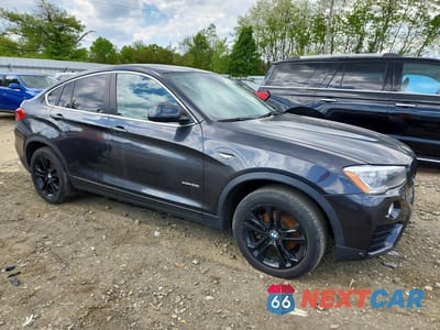 Czwarte zdjęcie samochodu z boku: 2015 BMW X4 XDRIVE28I VIN:5UXXW3C50F0M88380 - miniatura