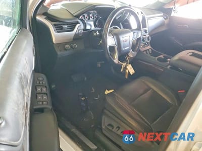 Zdjęcie 8 z 13 samochodu: 2019 GMC YUKON SLT VIN:1GKS2BKC8KR183768 - miniatura