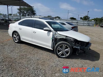 Czwarte zdjęcie samochodu z boku: 2014 VOLKSWAGEN PASSAT SE VIN:1VWBT7A34EC089544 - miniatura