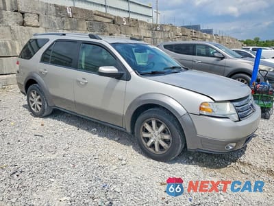 Czwarte zdjęcie samochodu z boku: 2008 FORD TAURUS X SEL VIN:1FMDK02W28GA07060 - miniatura
