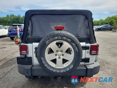 Zdjęcie 6 z 13 samochodu: 2010 JEEP WRANGLER UNLIMITED SPORT VIN:1J4HA3H14AL224672 - miniatura