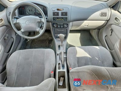 Zdjęcie 8 z 12 samochodu: 2001 TOYOTA COROLLA CE VIN:1NXBR12E31Z500978 - miniatura