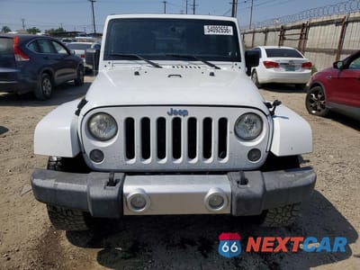 Piąte zdjęcie samochodu w środku: 2014 JEEP WRANGLER UNLIMITED SAHARA VIN:1C4BJWEG0EL212501 - miniatura