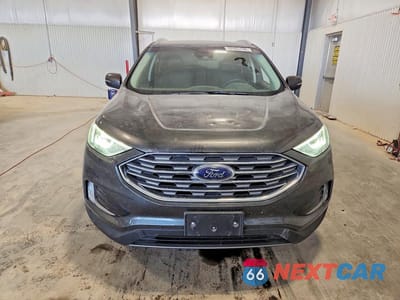 Piąte zdjęcie samochodu w środku: 2019 FORD EDGE TITANIUM VIN:2FMPK4K96KBC73369 - miniatura