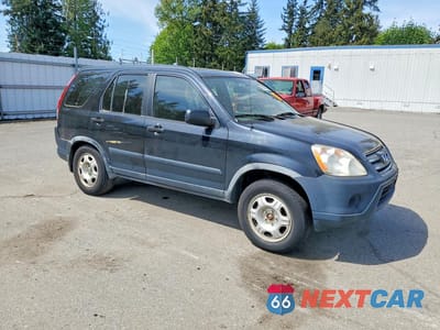 Czwarte zdjęcie samochodu z boku: 2006 HONDA CR-V LX VIN:JHLRD685X6C006624 - miniatura