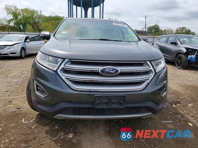 Piąte zdjęcie samochodu w środku: 2016 FORD EDGE TITANIUM VIN:2FMPK4K99GBB23196 - miniatura