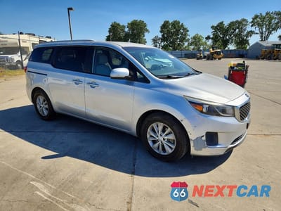 Czwarte zdjęcie samochodu z boku: 2015 KIA SEDONA LX VIN:KNDMB5C18F6062622 - miniatura