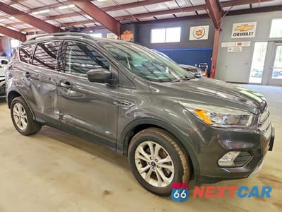 Czwarte zdjęcie samochodu z boku: 2018 FORD ESCAPE SE VIN:1FMCU9GDXJUA65913 - miniatura