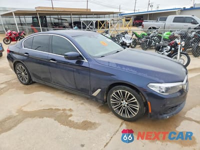 Czwarte zdjęcie samochodu z boku: 2018 BMW 530 XI VIN:WBAJA7C54JWC75807 - miniatura