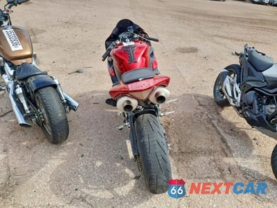 Czwarte zdjęcie samochodu z boku: 2004 YAMAHA YZFR1 C VIN:JYARN13Y14A000326 - miniatura