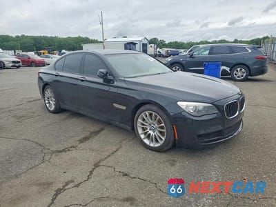 Czwarte zdjęcie samochodu z boku: 2014 BMW 750 XI VIN:WBAYB6C53ED224352 - miniatura