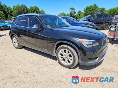 Czwarte zdjęcie samochodu z boku: 2014 BMW X1 XDRIVE28I VIN:WBAVL1C50EVR94361 - miniatura