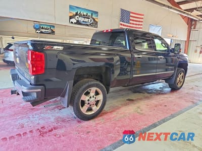 Trzecie zdjęcie samochodu z tyłu: 2016 CHEVROLET SILVERADO K2500 HEAVY DUTY LTZ VIN:1GC1KWEG0GF278900 - miniatura