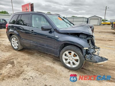 Czwarte zdjęcie samochodu z boku: 2010 SUZUKI GRAND VITARA JLX VIN:JS3TE1D93A4110131 - miniatura