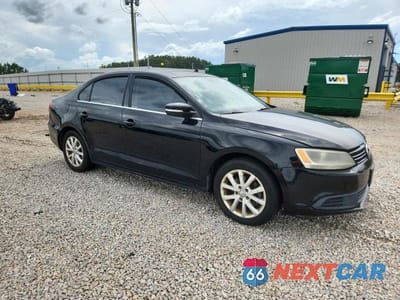 Czwarte zdjęcie samochodu z boku: 2013 VOLKSWAGEN JETTA SE VIN:3VWDX7AJ3DM425533 - miniatura