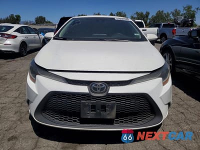 Piąte zdjęcie samochodu w środku: 2021 TOYOTA COROLLA LE VIN:5YFEPMAEXMP147506 - miniatura
