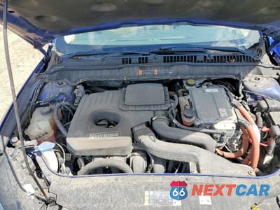 Zdjęcie 11 z 12 samochodu: 2013 FORD FUSION SE HYBRID VIN:3FA6P0LU7DR175670 - miniatura