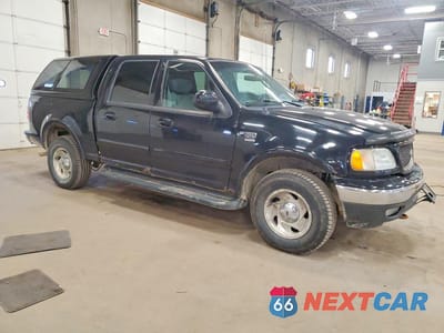 Czwarte zdjęcie samochodu z boku: 2003 FORD F150 SUPERCREW VIN:1FTRW08L03KA65945 - miniatura