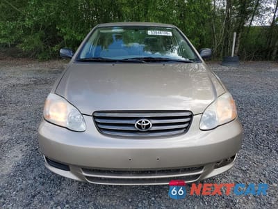 Piąte zdjęcie samochodu w środku: 2004 TOYOTA COROLLA CE VIN:1NXBR32E34Z257219 - miniatura
