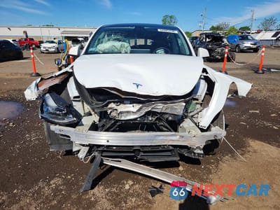 Piąte zdjęcie samochodu w środku: 2022 TESLA MODEL Y VIN:7SAYGDEE7NF364440 - miniatura